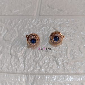 arete con piedra azul y zicones