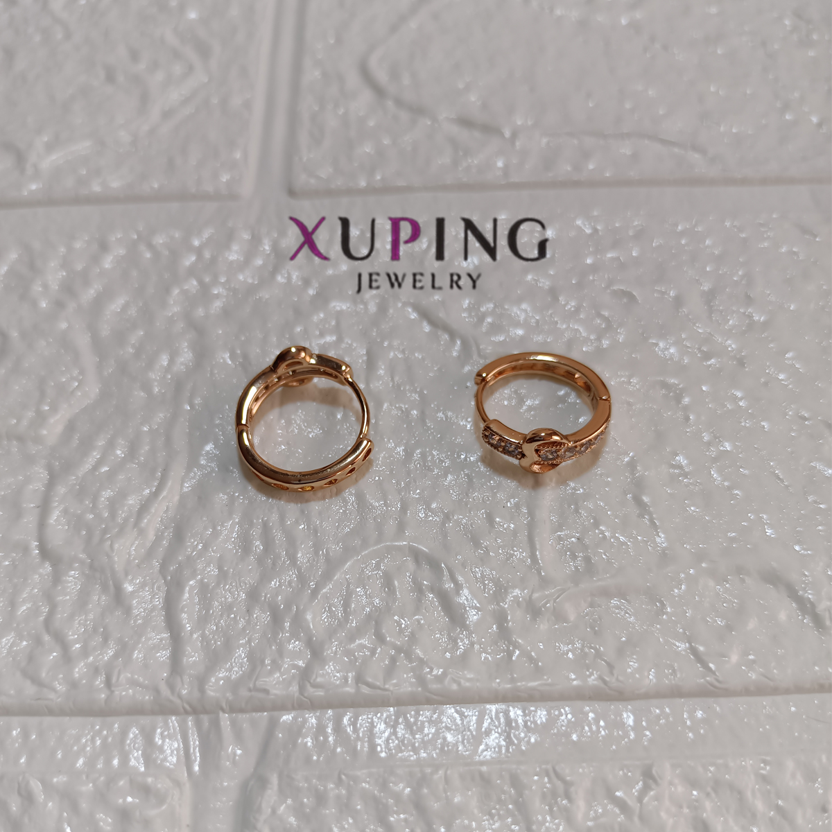 arete con corazon y zircones