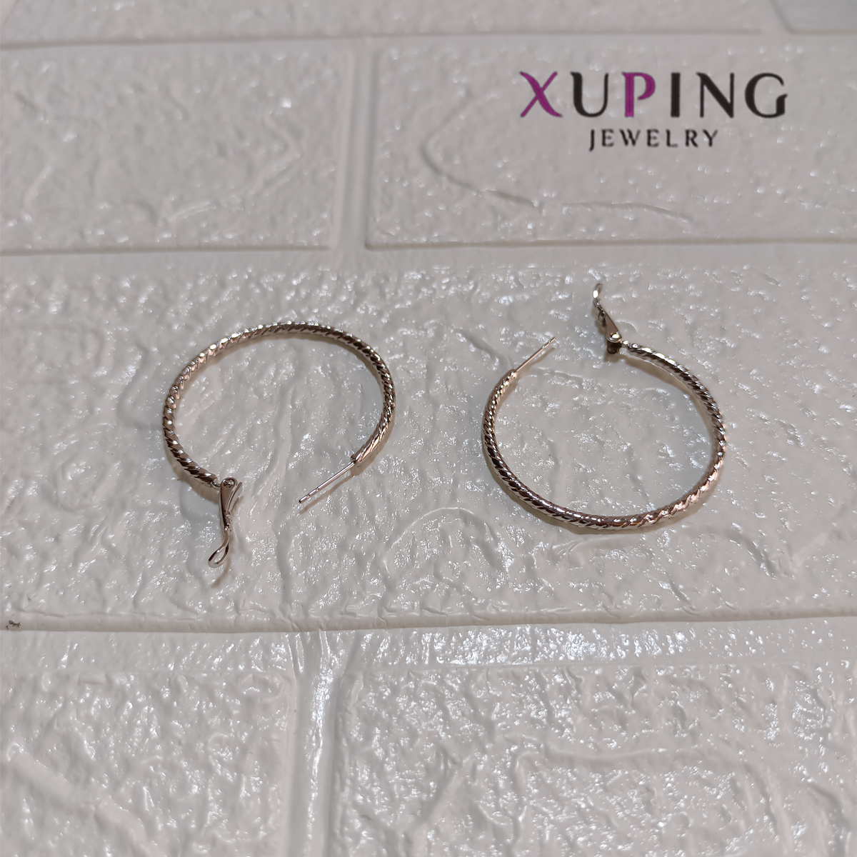 Aretes tipo soga plateados
